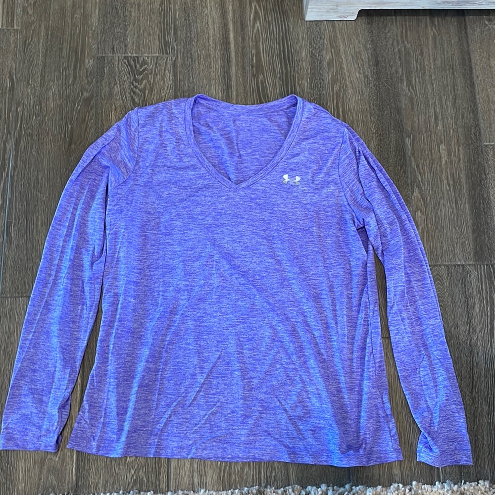Light purple long-sleeve Under Armour shirt.